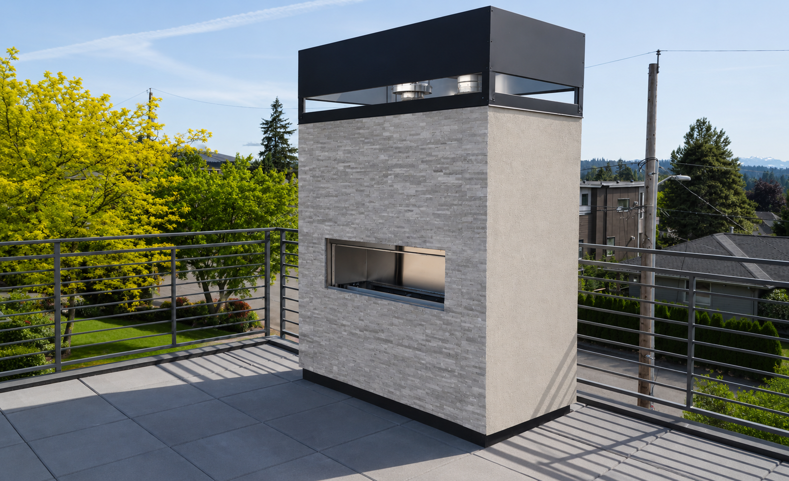 Rooftop fireplace with stone veneer and stucco side wall